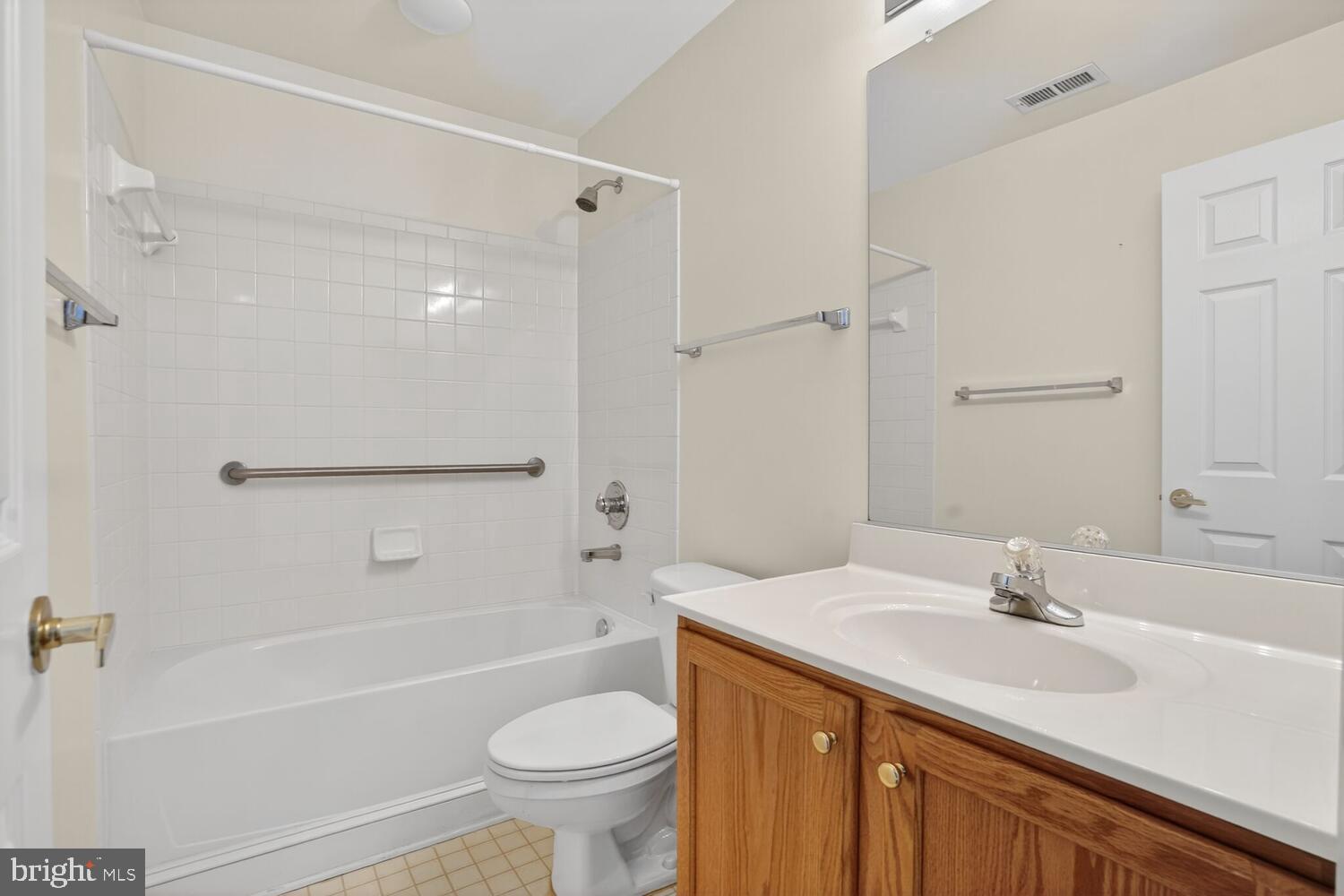 6767 Derby Run Way Gainesville, VA 20155 - Photo 29 of 37 a bathroom with a sink a toilet and shower