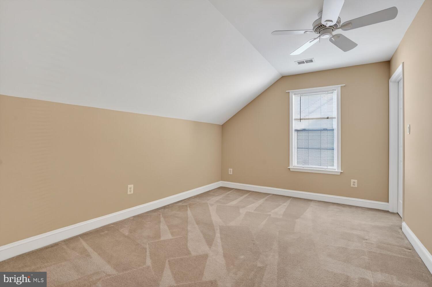 6767 Derby Run Way Gainesville, VA 20155 - Photo 30 of 37 an empty room with windows and fan