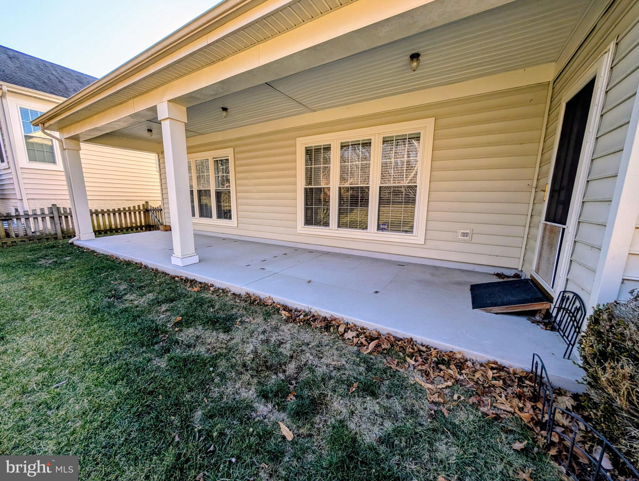 6767 Derby Run Way Gainesville, VA 20155 - Photo 37 of 37 a view of front door of house with yard