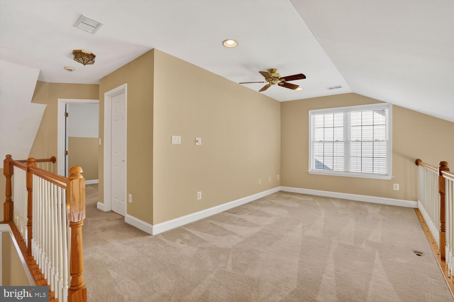 6767 Derby Run Way Gainesville, VA 20155 - Photo 6 of 37 a view of an empty room with a window
