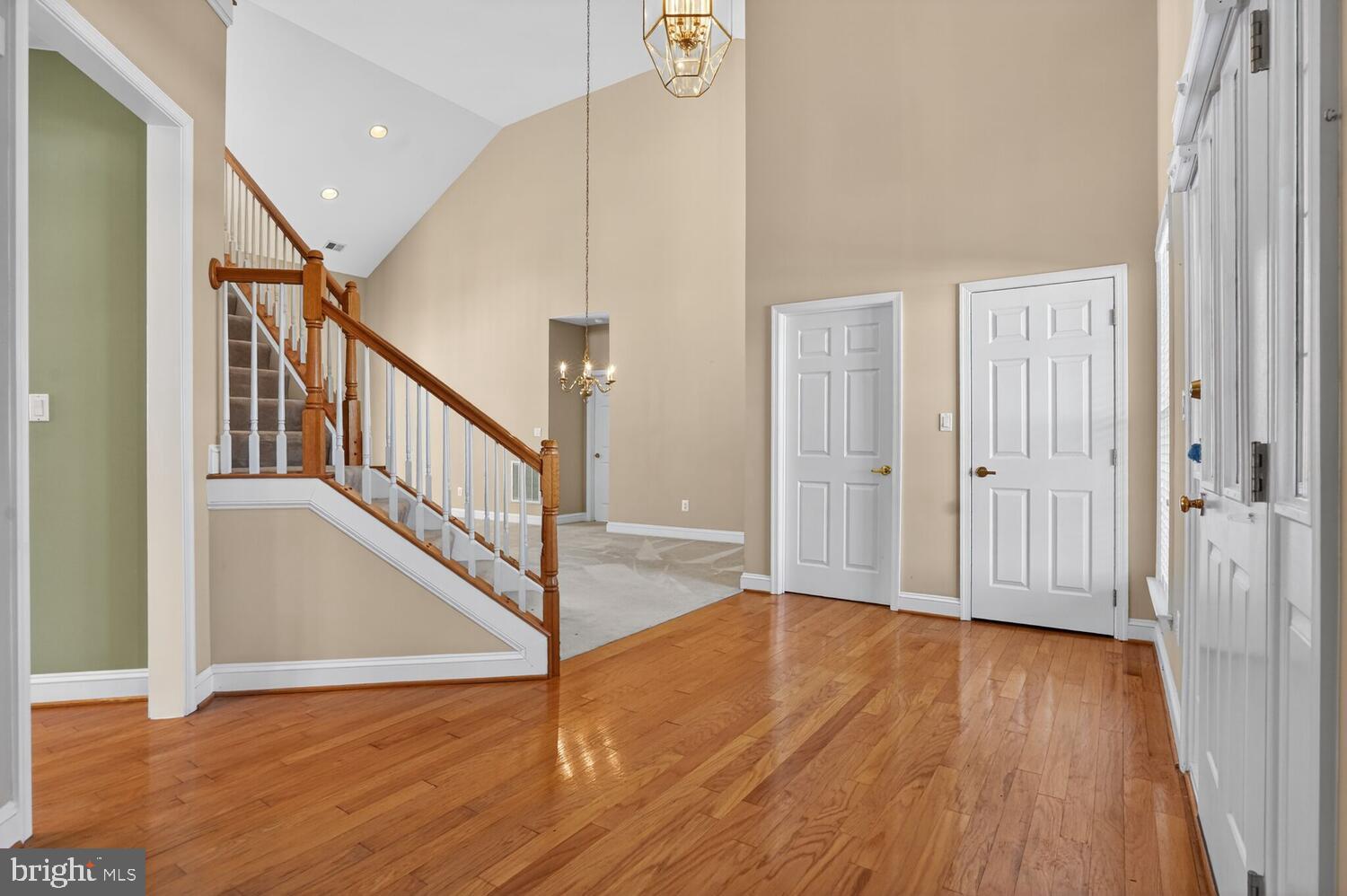 6767 Derby Run Way Gainesville, VA 20155 - Photo 7 of 37 a view of an entryway with wooden floor