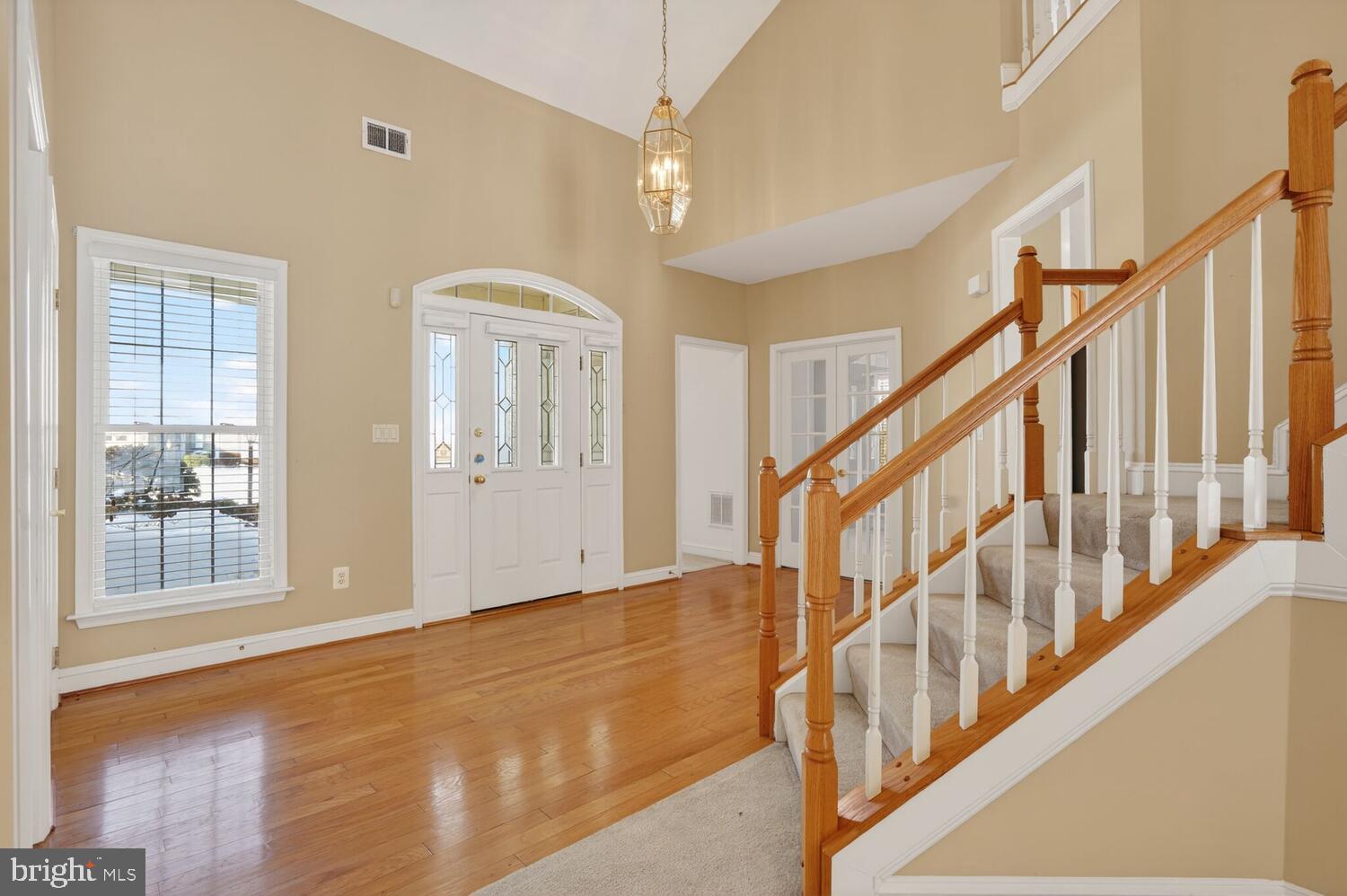 6767 Derby Run Way Gainesville, VA 20155 - Photo 8 of 37 a view of an entryway with staircase