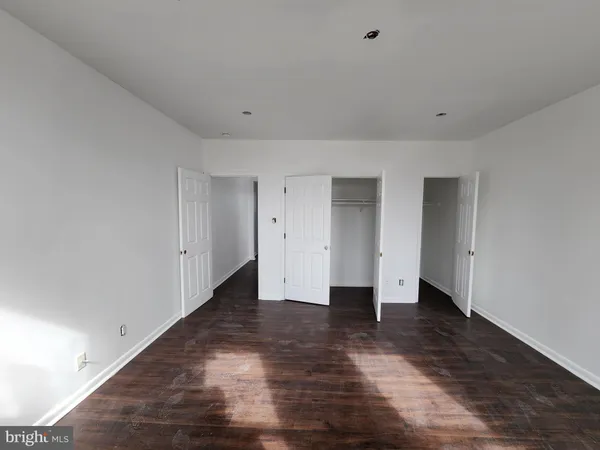 a view of a hallway with the glass door
