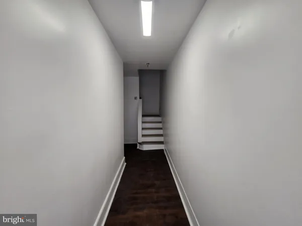a view of a hallway with a couch