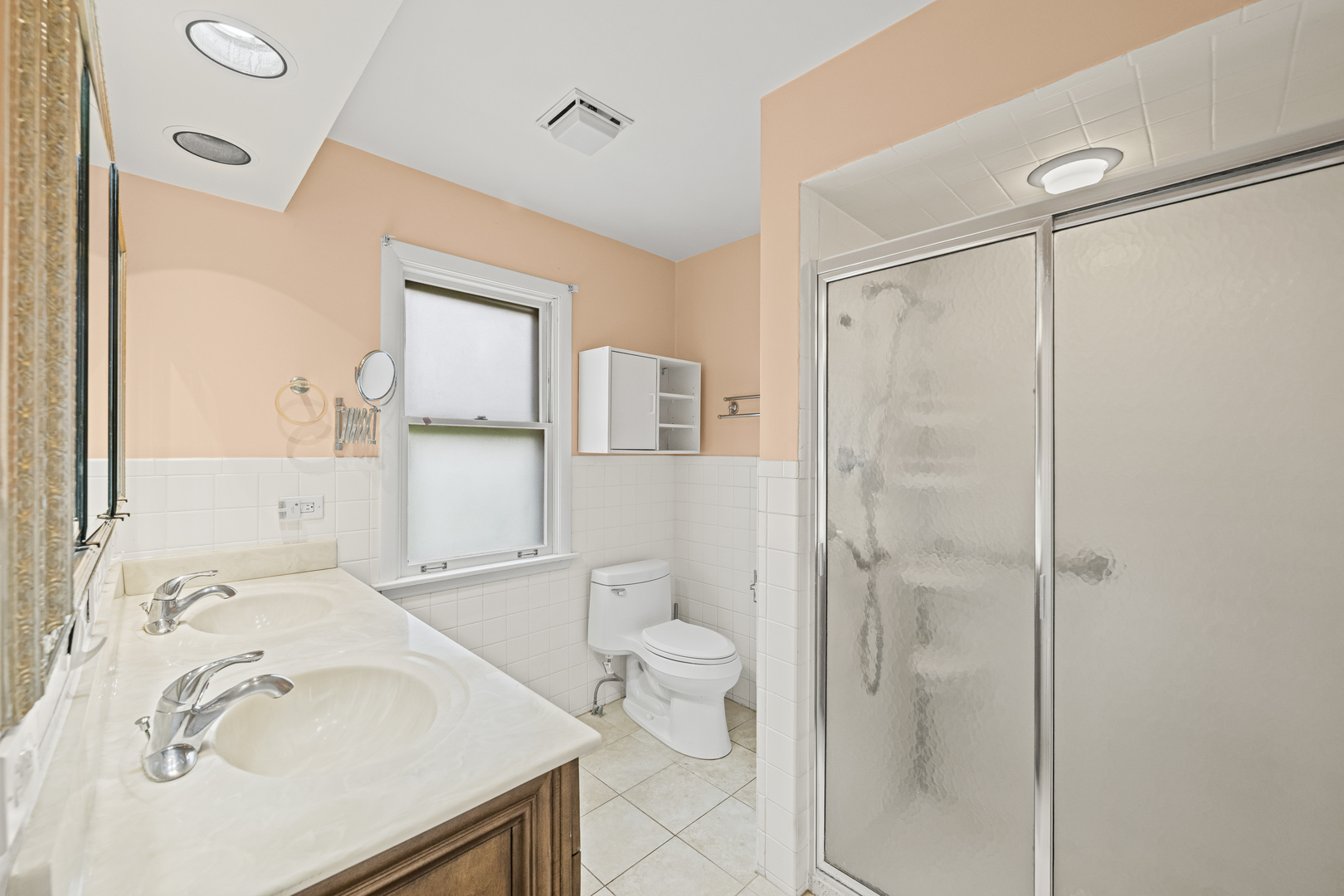 1125 Hohlfelder Road Glencoe, IL 60022 - Photo 12 of 25 a bathroom with a sink toilet and shower