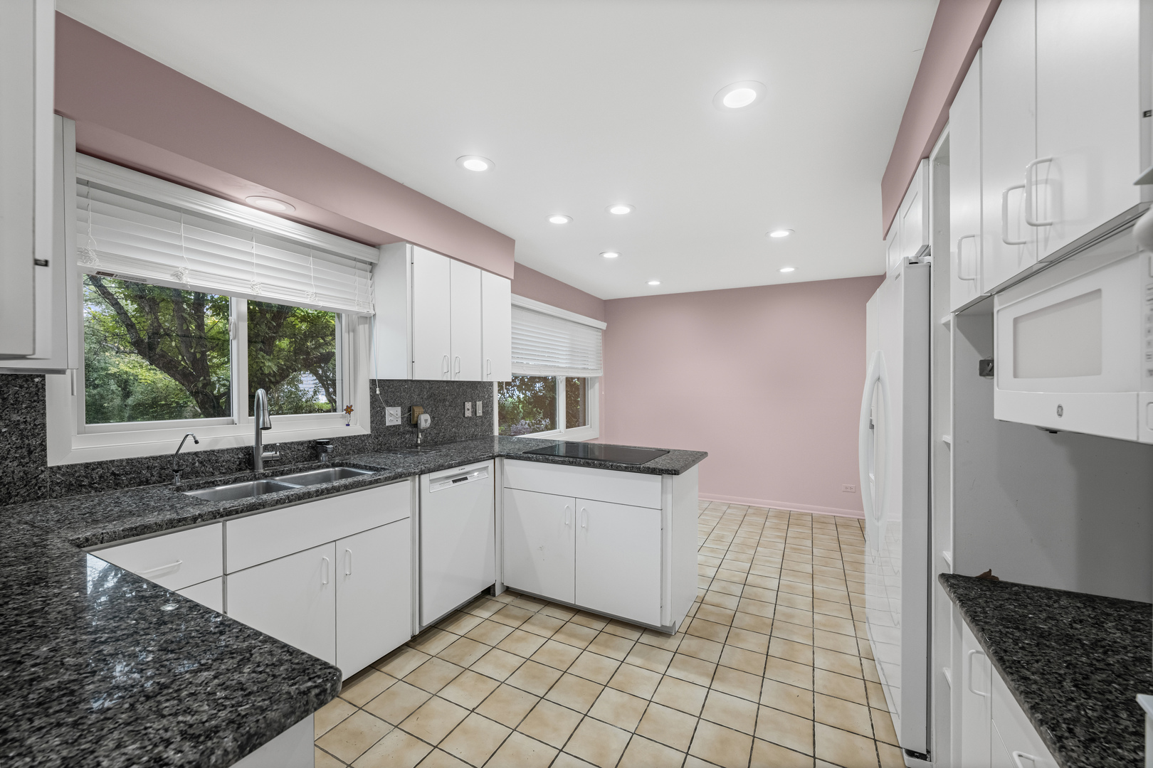 1125 Hohlfelder Road Glencoe, IL 60022 - Photo 6 of 25 a kitchen with a sink and cabinets