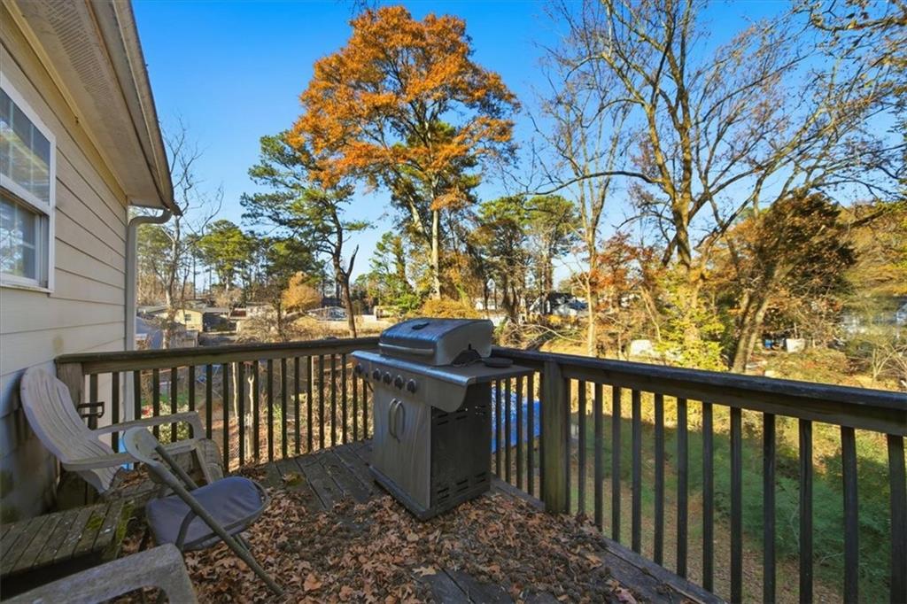 6283 Susan Lane Doraville, GA 30340 - Photo 28 of 34 a view of a balcony with wooden floor and fence