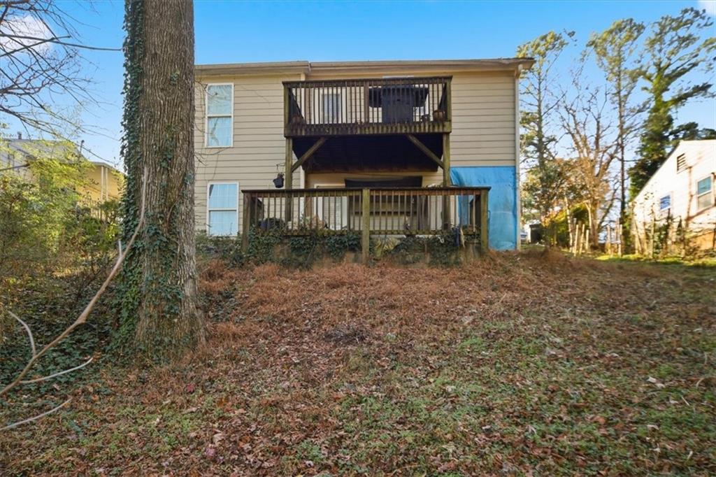 6283 Susan Lane Doraville, GA 30340 - Photo 29 of 34 a view of a house with a yard and sitting area