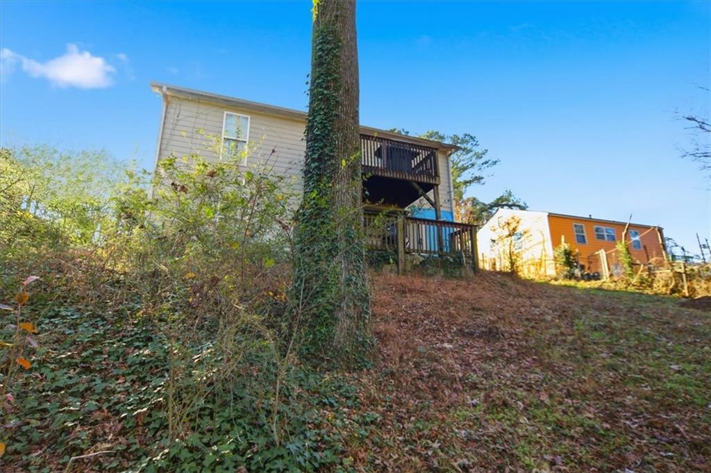 6283 Susan Lane Doraville, GA 30340 - Photo 30 of 34 a view of a house with a yard and sitting area