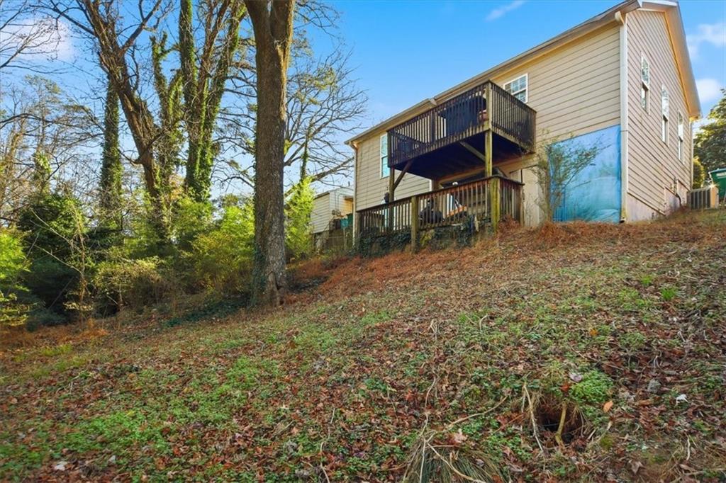 6283 Susan Lane Doraville, GA 30340 - Photo 31 of 34 a view of a house with a yard