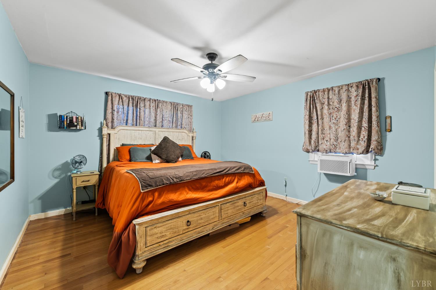 1872 Wards Road Hurt, VA 24563 - Photo 16 of 54 a bedroom with a bed and a chandelier
