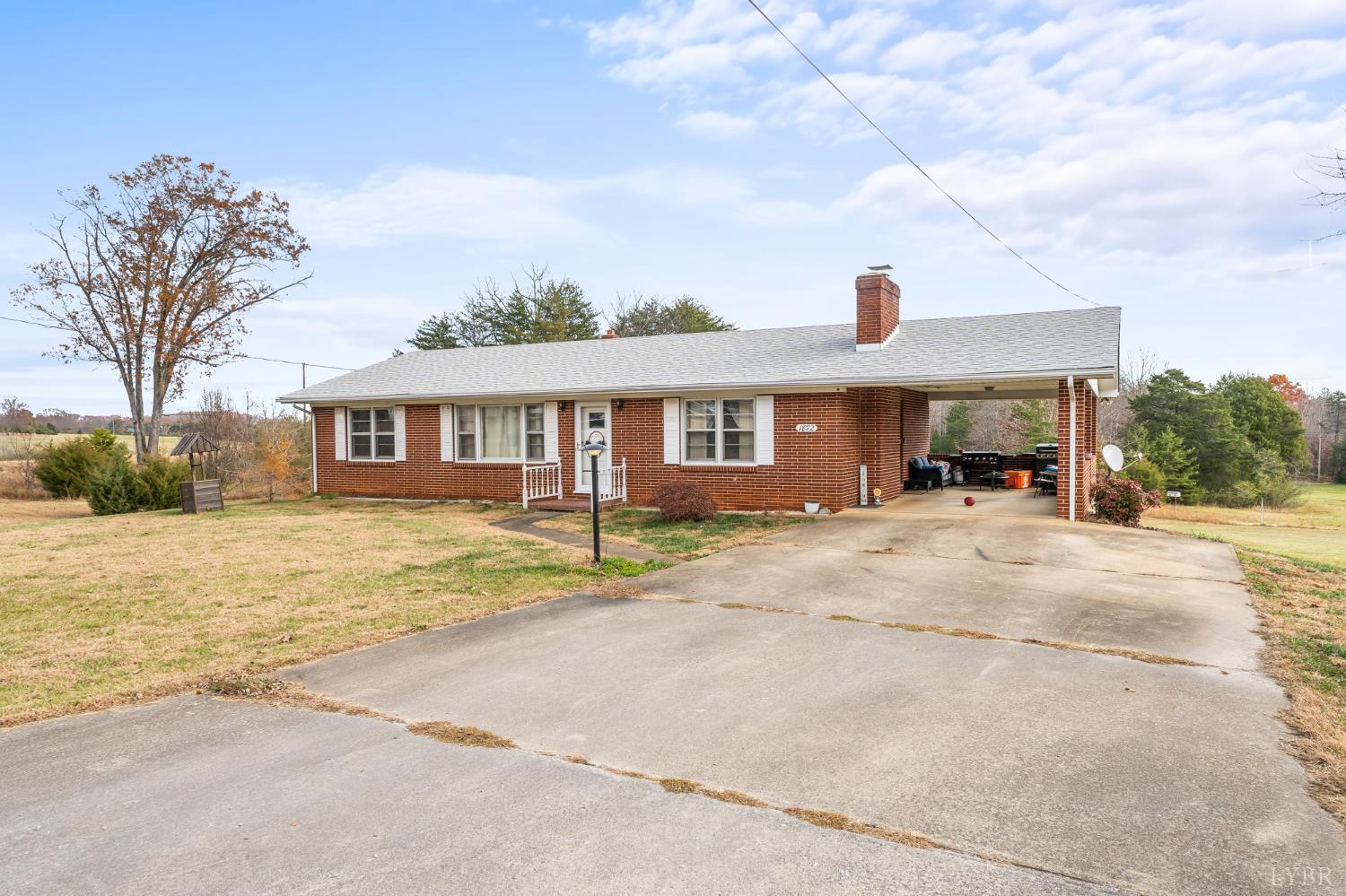 1872 Wards Road Hurt, VA 24563 - Photo 3 of 54 front view of a house with a patio