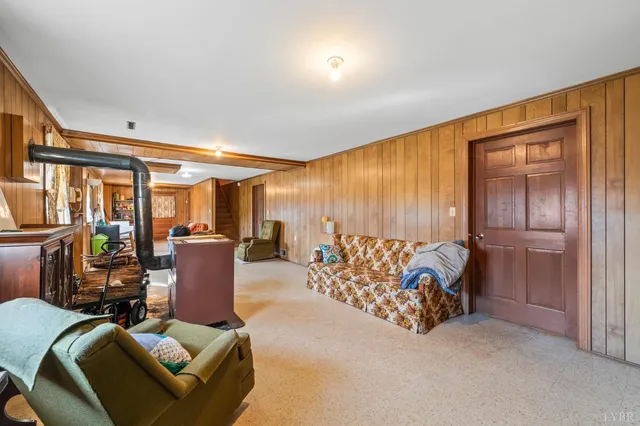 a bed room with furniture and a window