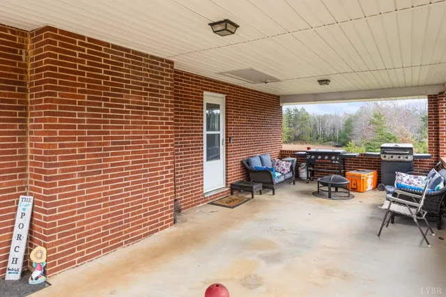 a view of a swimming pool with a yard