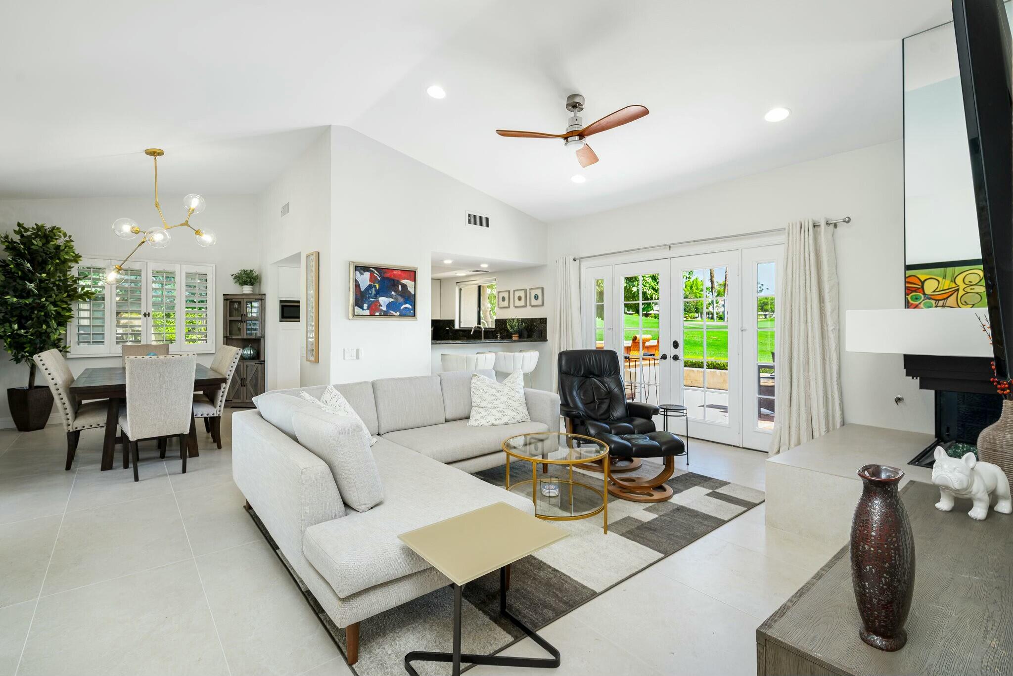 38 Mission Court Rancho Mirage, CA 92270 - Photo 26 of 61 a living room with furniture and a window