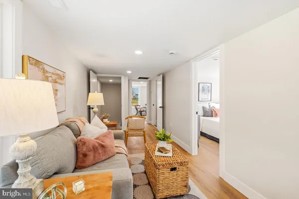 a living room with furniture and a table