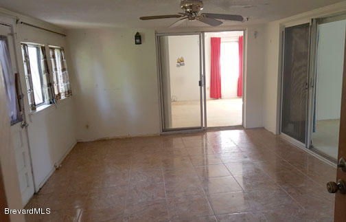 1336 Cromey Road Northeast Palm Bay, FL 32905 - Photo 12 of 25 Florida Room