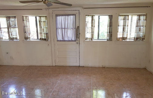 1336 Cromey Road Northeast Palm Bay, FL 32905 - Photo 13 of 25 Florida Room