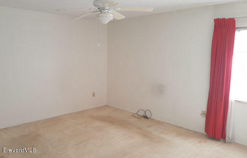 1336 Cromey Road Northeast Palm Bay, FL 32905 - Photo 14 of 25 Master Bedroom