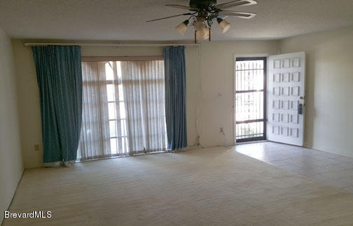1336 Cromey Road Northeast Palm Bay, FL 32905 - Photo 3 of 25 Living Room