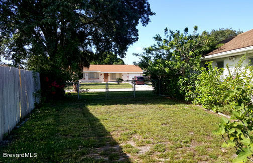 1336 Cromey Road Northeast Palm Bay, FL 32905 - Photo 24 of 25 Side Yard
