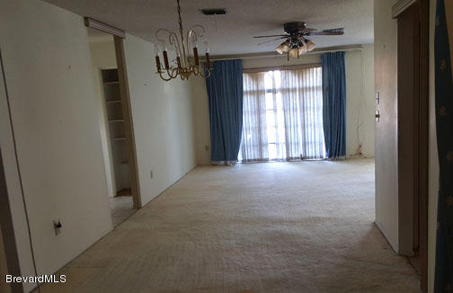 1336 Cromey Road Northeast Palm Bay, FL 32905 - Photo 4 of 25 Living/Dining