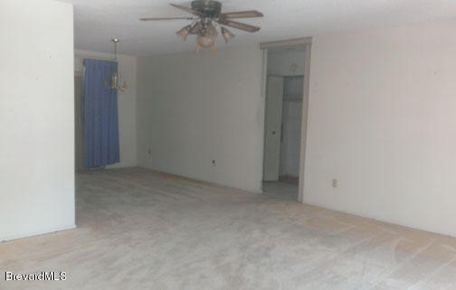 1336 Cromey Road Northeast Palm Bay, FL 32905 - Photo 5 of 25 Living/Dining