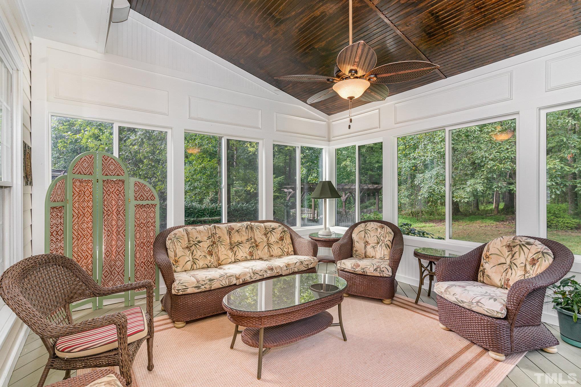 9409 Stone Mountain Road Raleigh, NC 27613 - Photo 18 of 53 a living room with furniture and a large window
