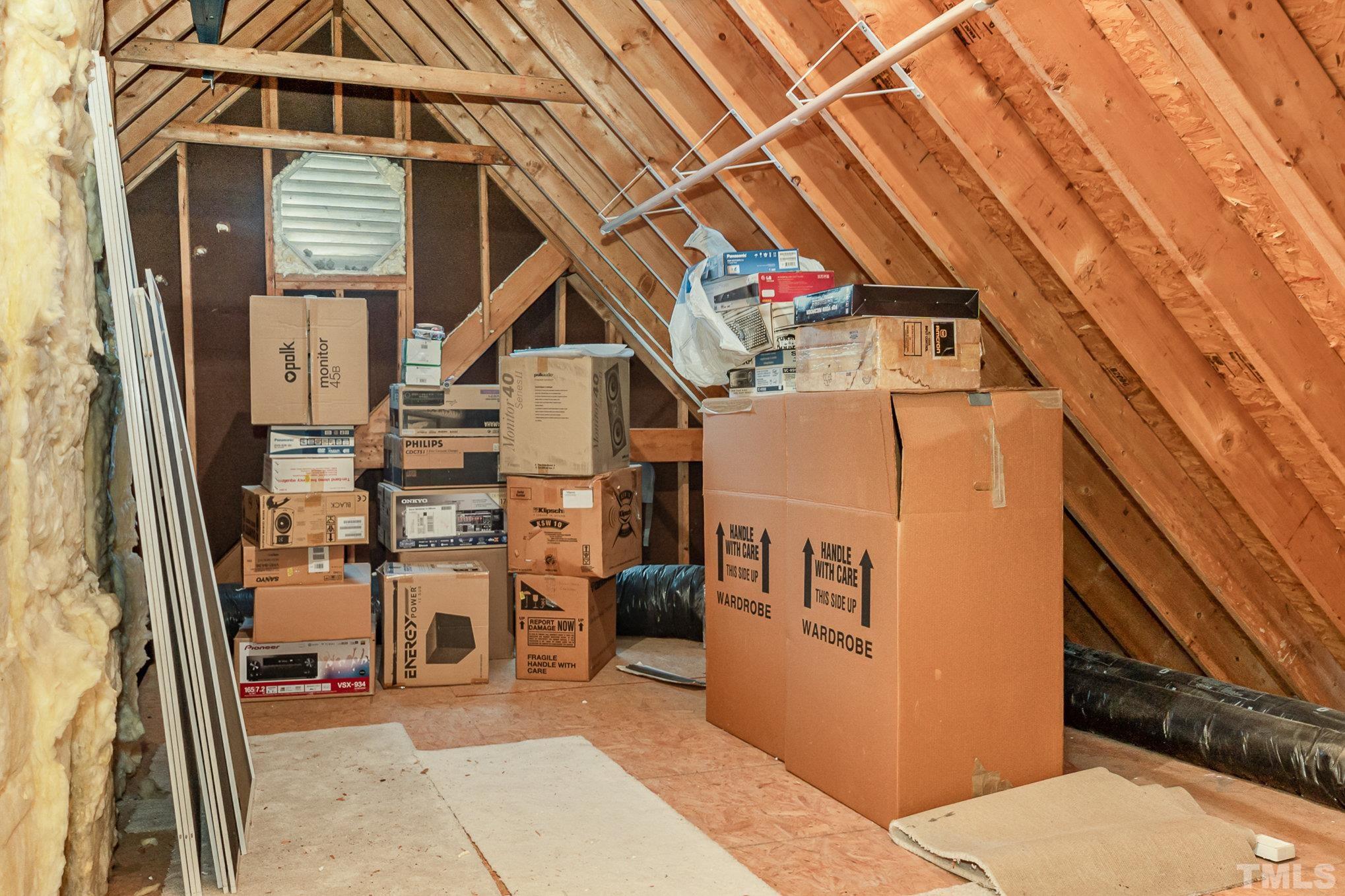 9409 Stone Mountain Road Raleigh, NC 27613 - Photo 35 of 53 a view of entryway with a flat screen tv