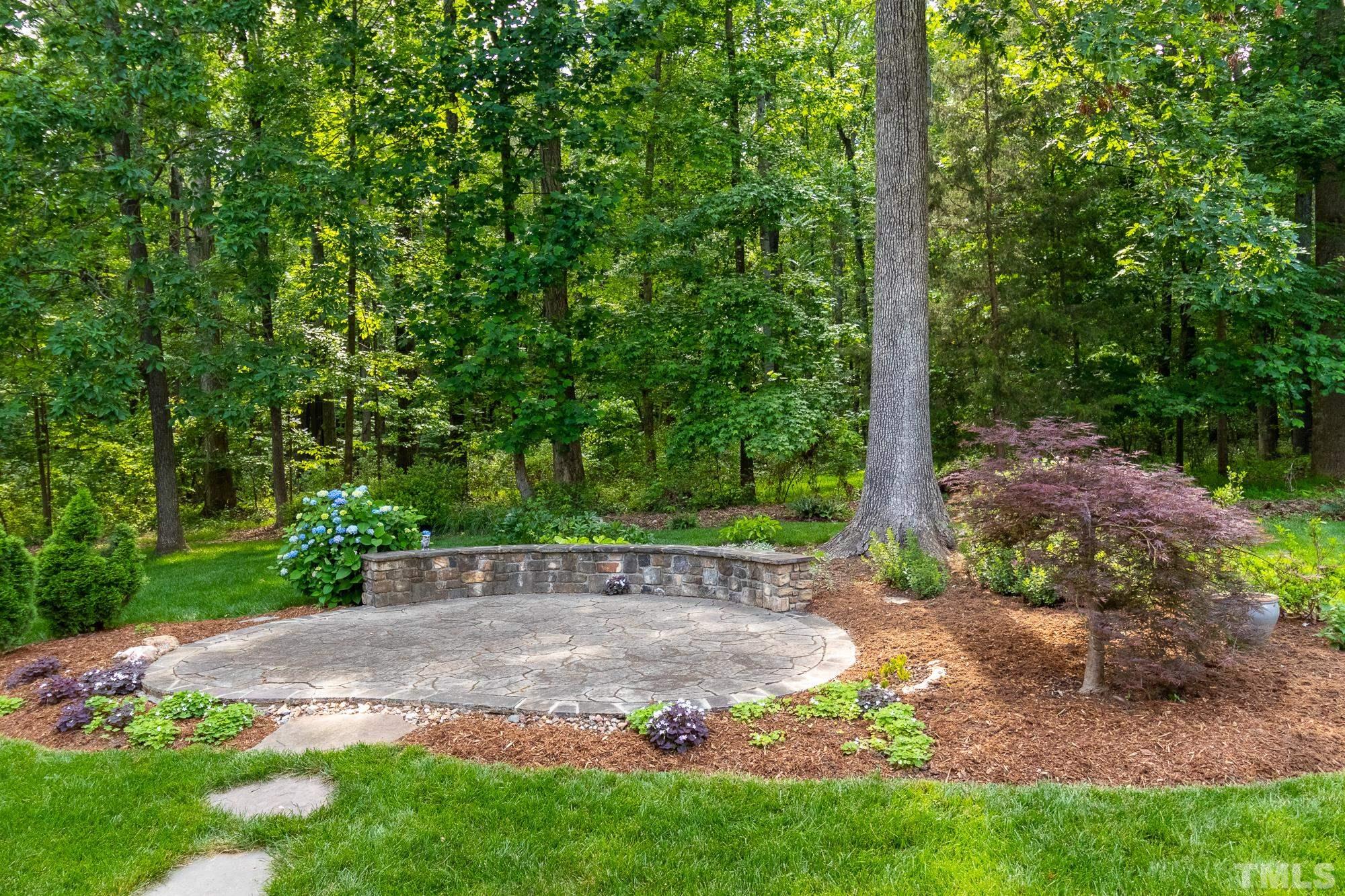 9409 Stone Mountain Road Raleigh, NC 27613 - Photo 38 of 53 a view of a back yard