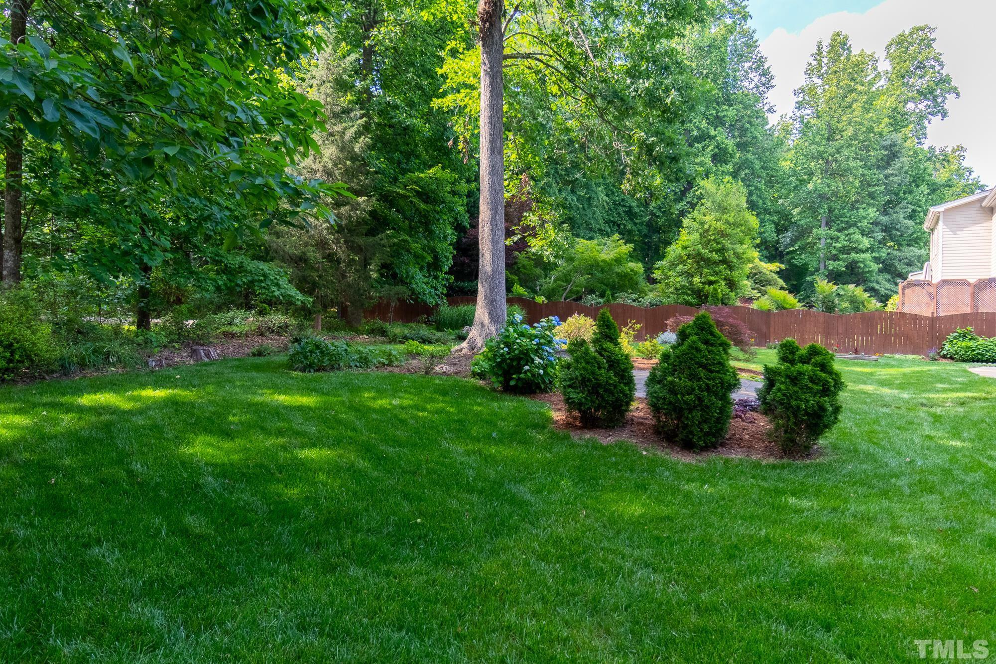 9409 Stone Mountain Road Raleigh, NC 27613 - Photo 41 of 53 a view of yard with green space
