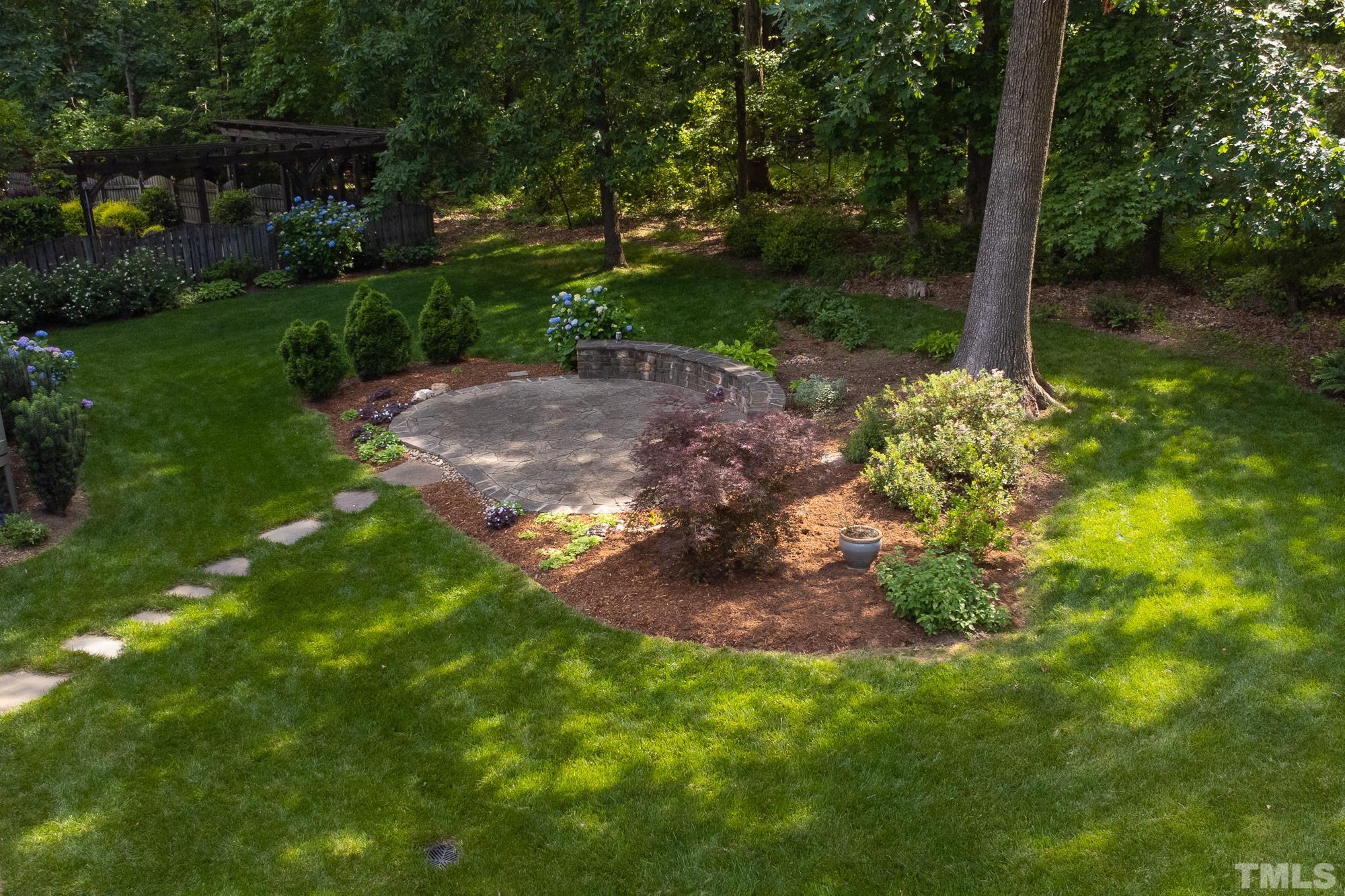 9409 Stone Mountain Road Raleigh, NC 27613 - Photo 45 of 53 a view of a yard