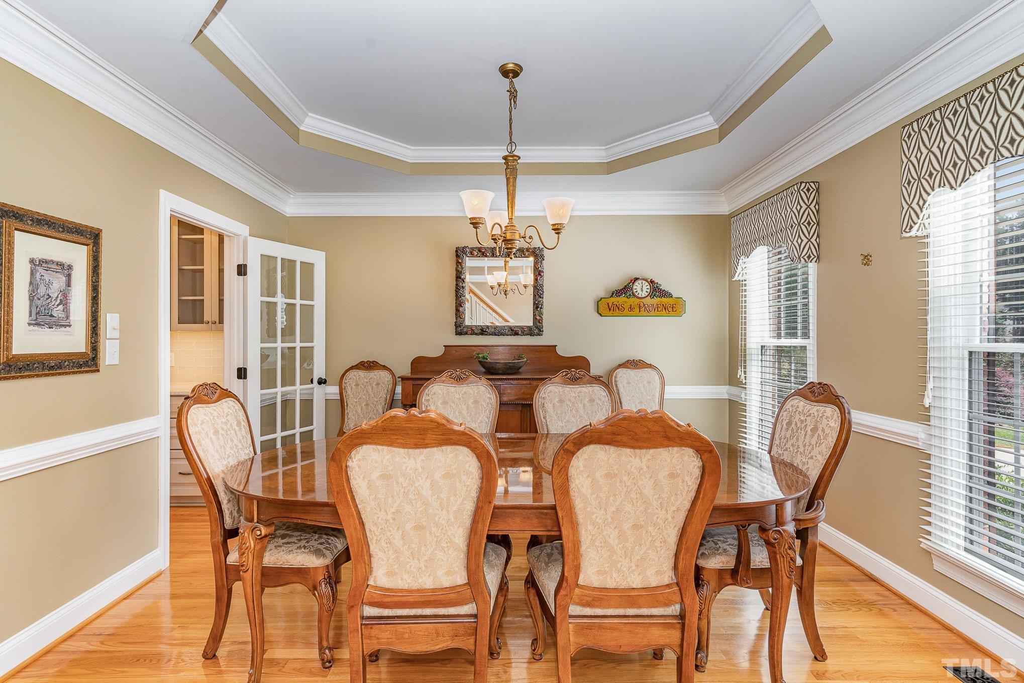 9409 Stone Mountain Road Raleigh, NC 27613 - Photo 6 of 53 a dining room with furniture and window