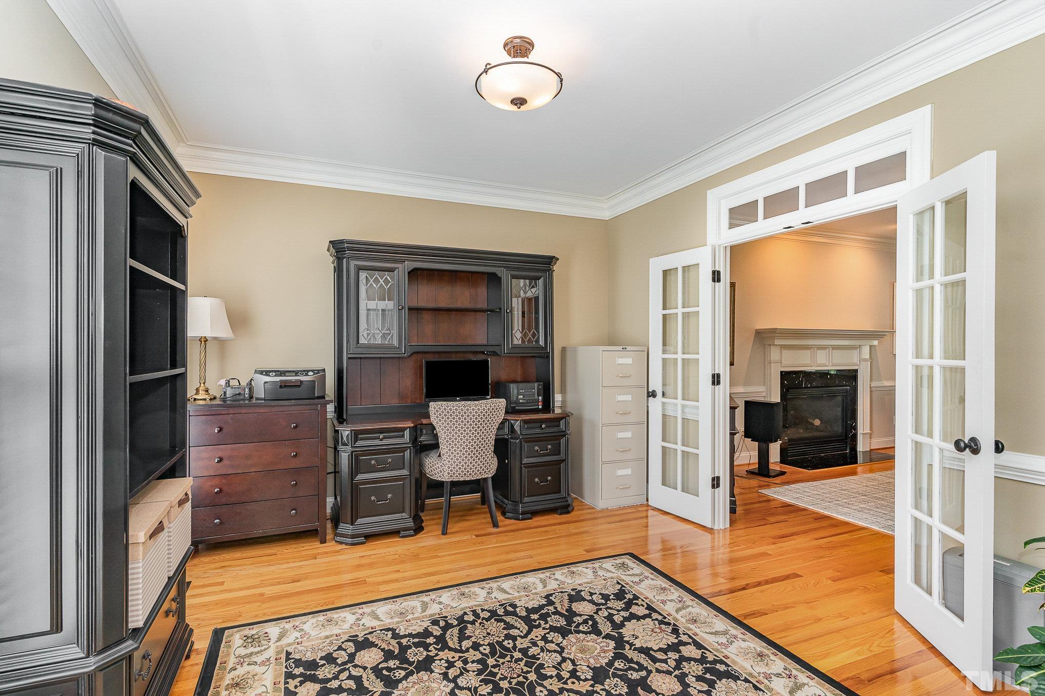9409 Stone Mountain Road Raleigh, NC 27613 - Photo 9 of 53 a room with furniture and a rug