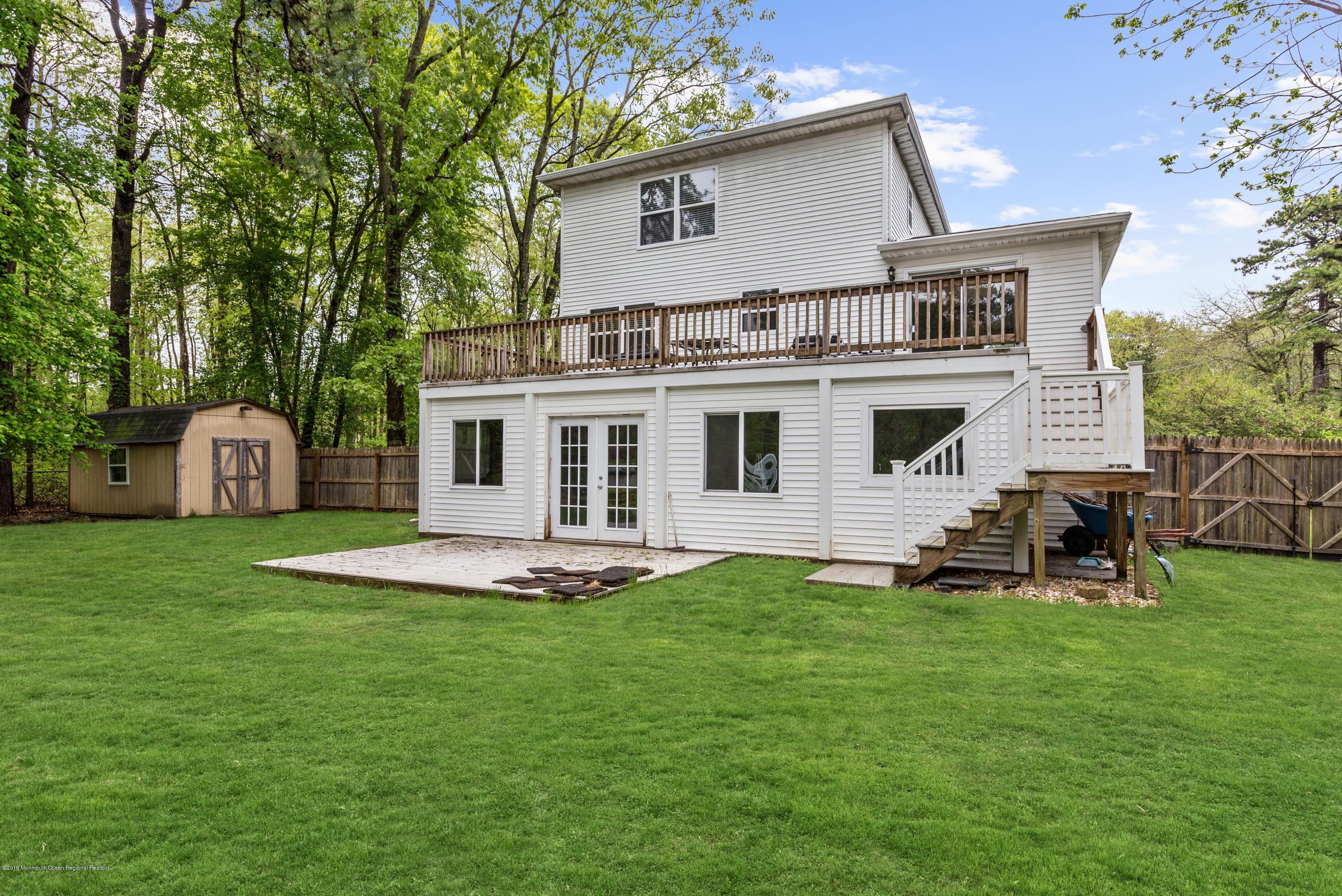 460 Cedar Swamp Road Jackson, NJ 08527 - Photo 2 of 38 a view of a house with a yard and sitting area