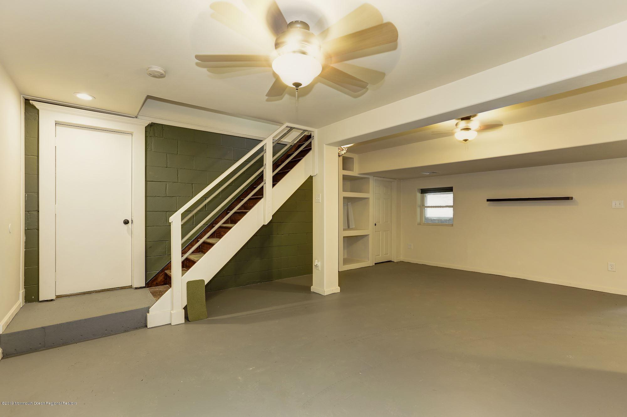 460 Cedar Swamp Road Jackson, NJ 08527 - Photo 28 of 38 a view of an empty room with a window