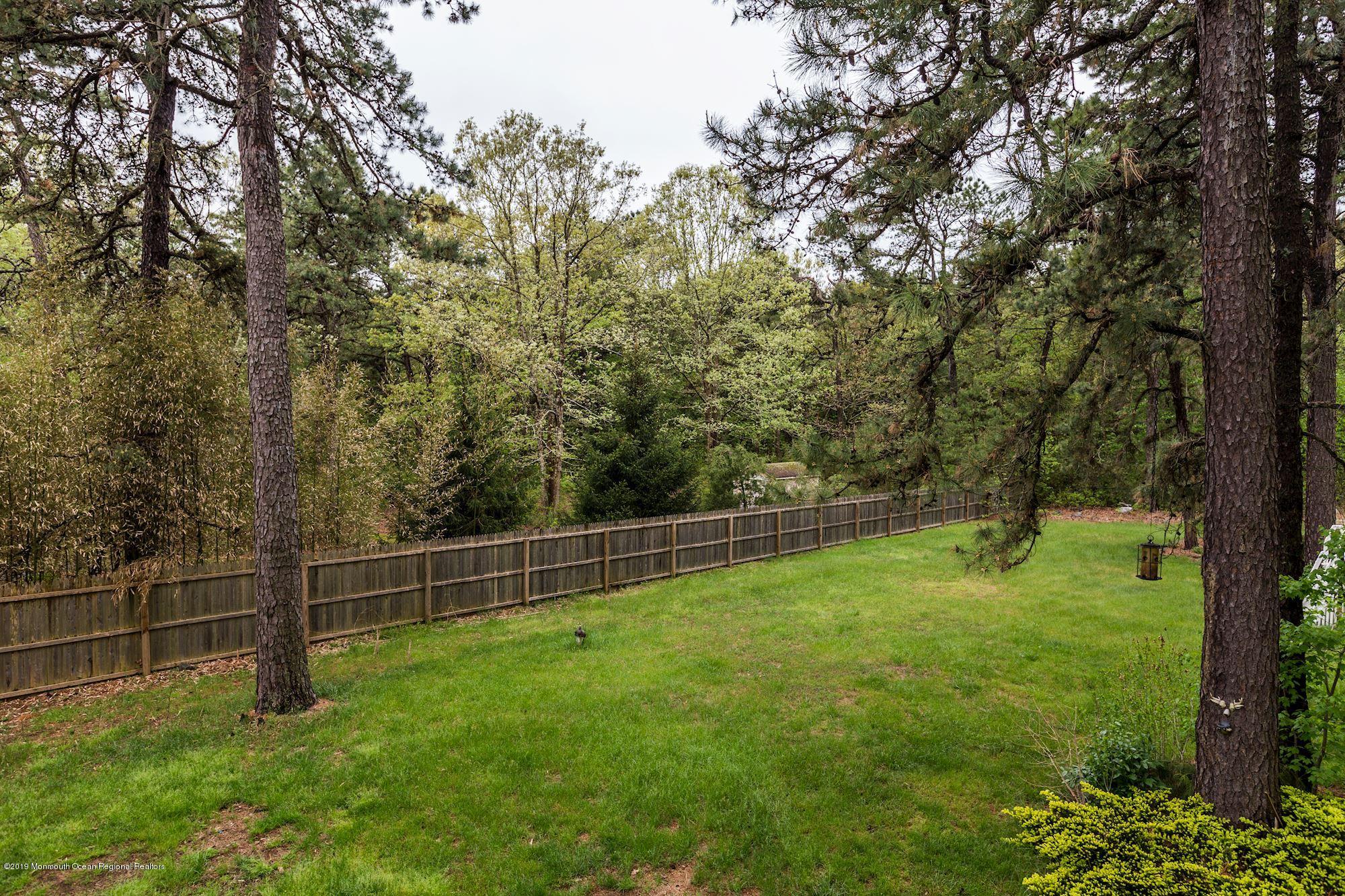 460 Cedar Swamp Road Jackson, NJ 08527 - Photo 38 of 38 a view of outdoor space with deck and yard