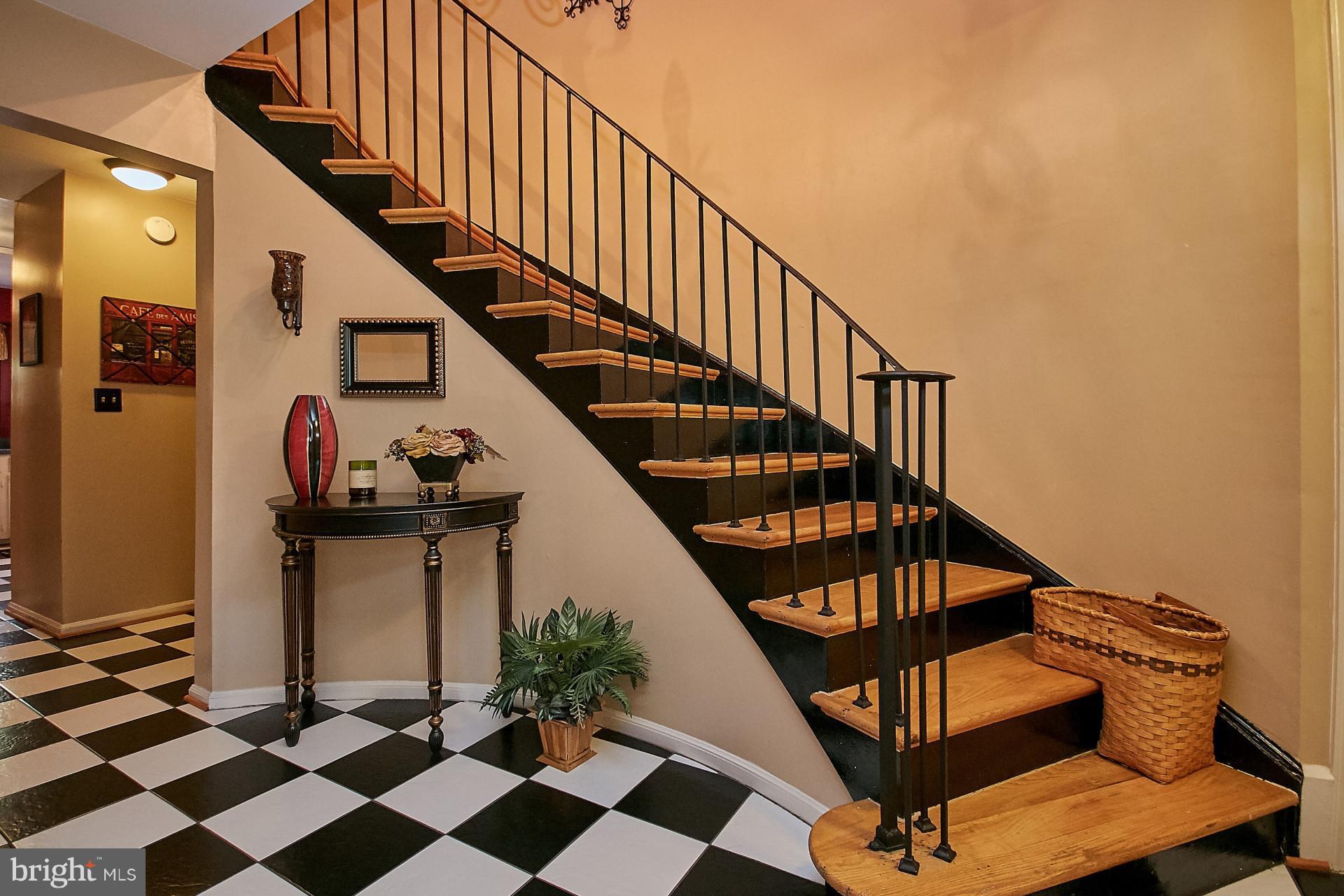 5959 Queenston Street Springfield, VA 22152 - Photo 5 of 30 Ceramic tile floor and curved staircase)