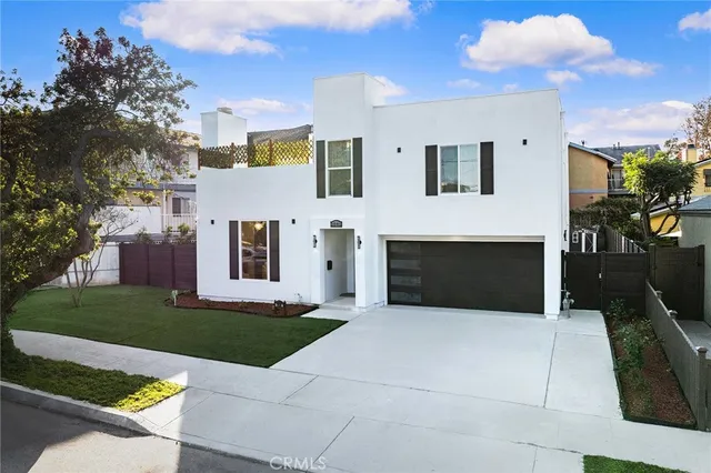 a front view of house with yard