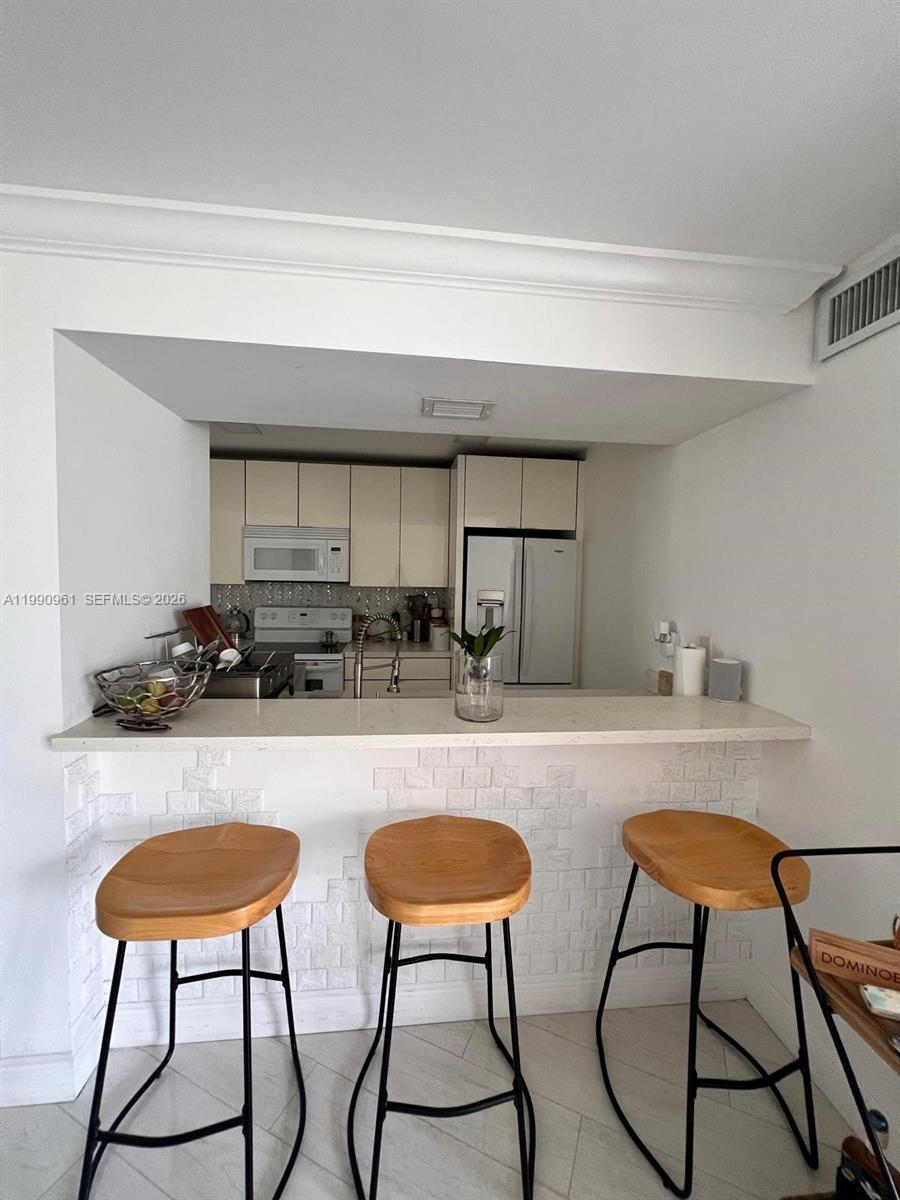 6955 Northwest 186th Street, Unit F104 Hialeah, FL 33015 - Photo 2 of 11