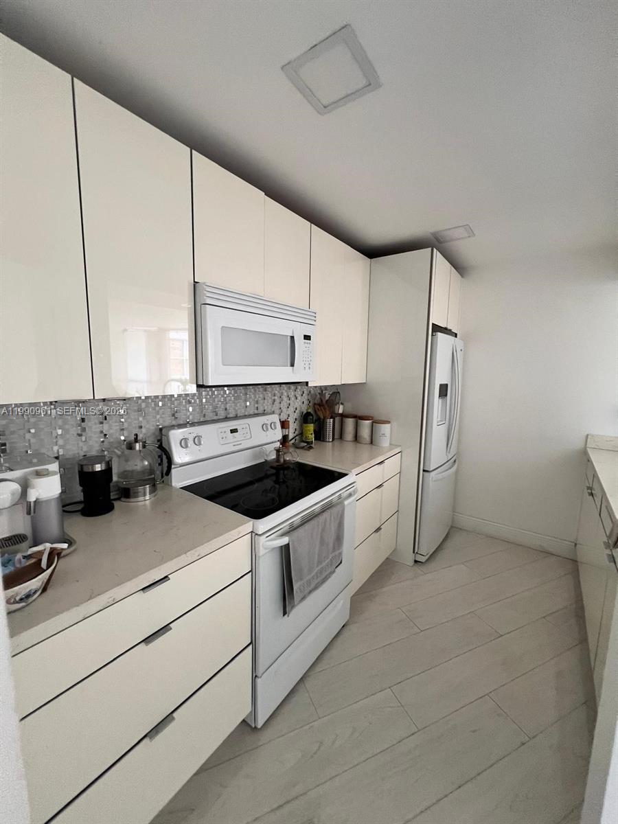 6955 Northwest 186th Street, Unit F104 Hialeah, FL 33015 - Photo 4 of 11