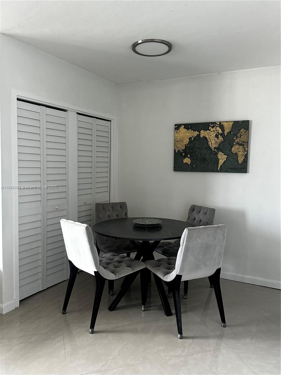 1200 West Avenue, Unit 914 Miami Beach, FL 33139 - Photo 19 of 38 a view of a workspace with furniture