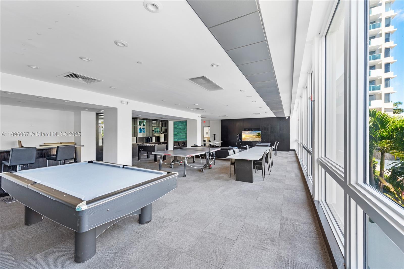 1200 West Avenue, Unit 914 Miami Beach, FL 33139 - Photo 27 of 38 a living room with furniture and a large window