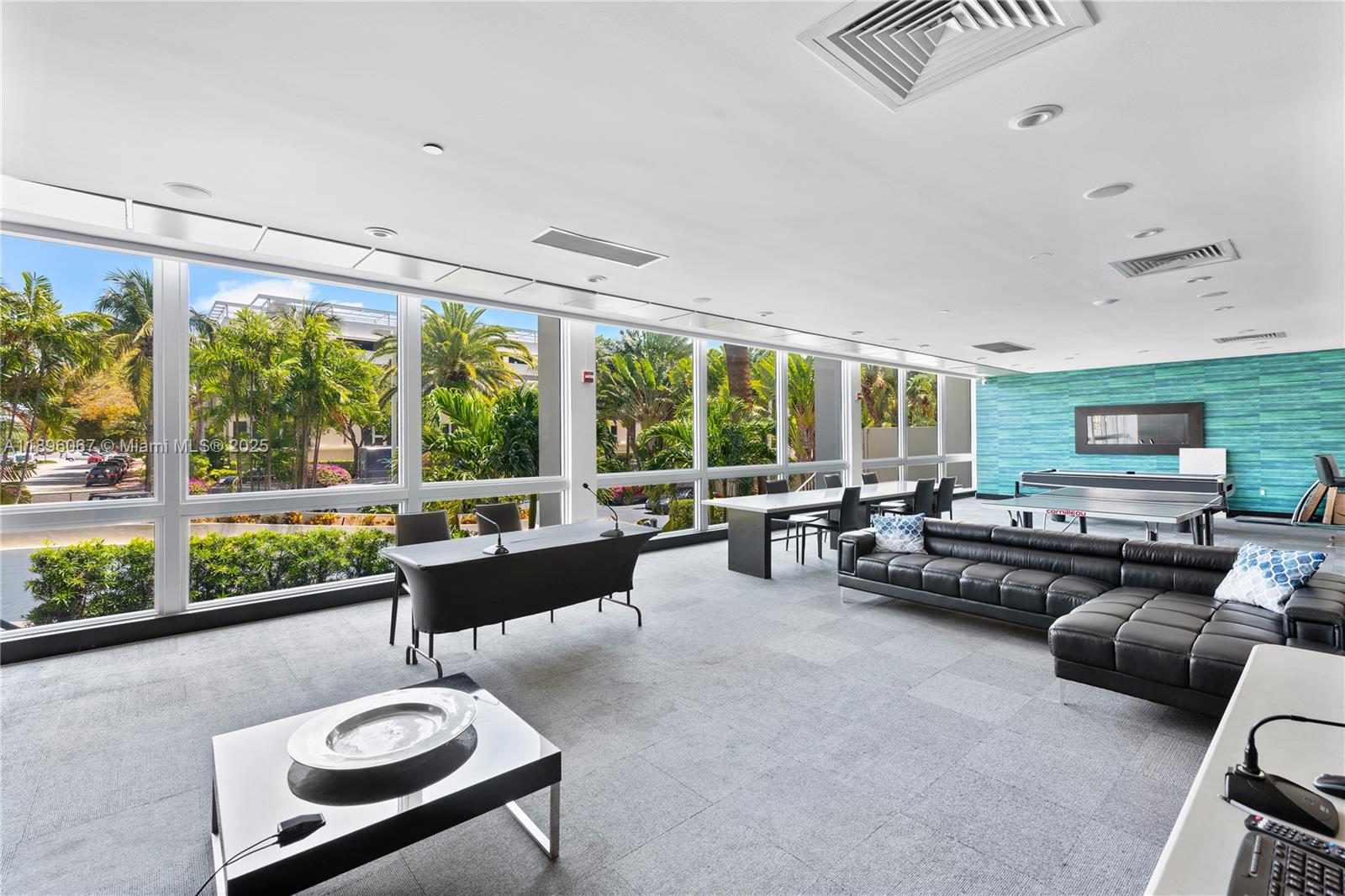 1200 West Avenue, Unit 914 Miami Beach, FL 33139 - Photo 28 of 38 a living room with furniture and a large window