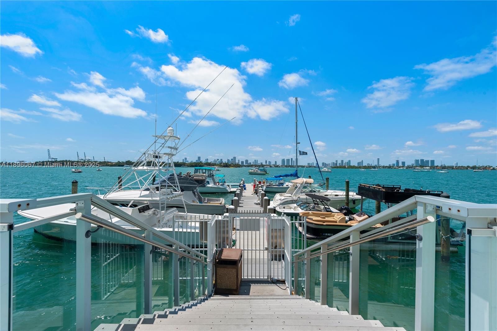 1200 West Avenue, Unit 914 Miami Beach, FL 33139 - Photo 31 of 38 a view of a house with pool and chairs