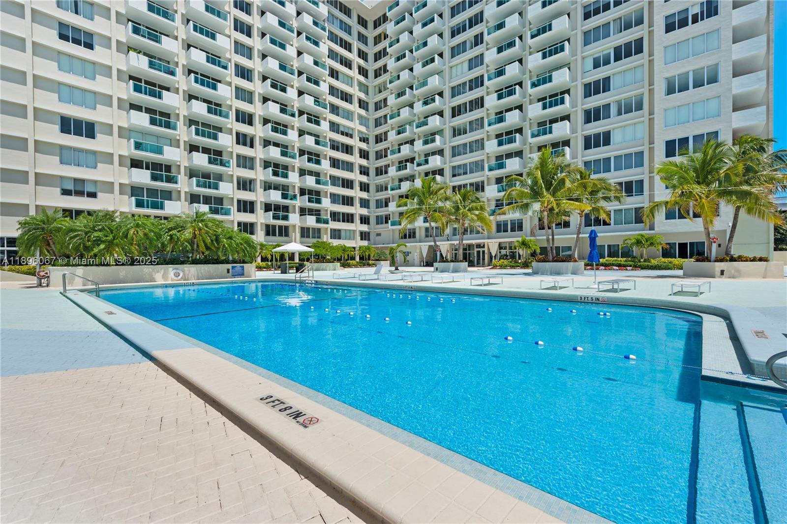 1200 West Avenue, Unit 914 Miami Beach, FL 33139 - Photo 32 of 38 a view of swimming pool with outdoor seating