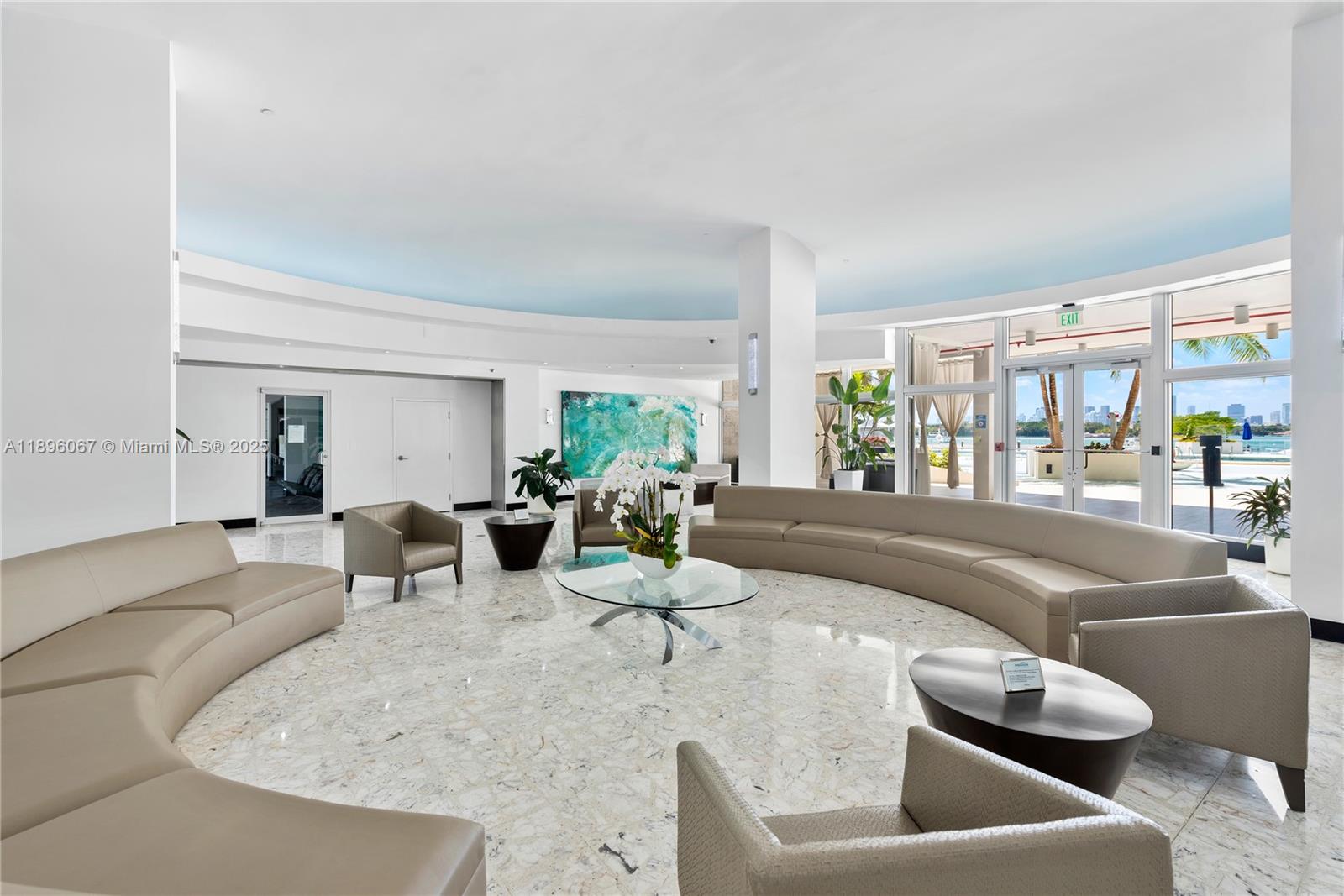 1200 West Avenue, Unit 914 Miami Beach, FL 33139 - Photo 7 of 38 a living room with furniture and a table