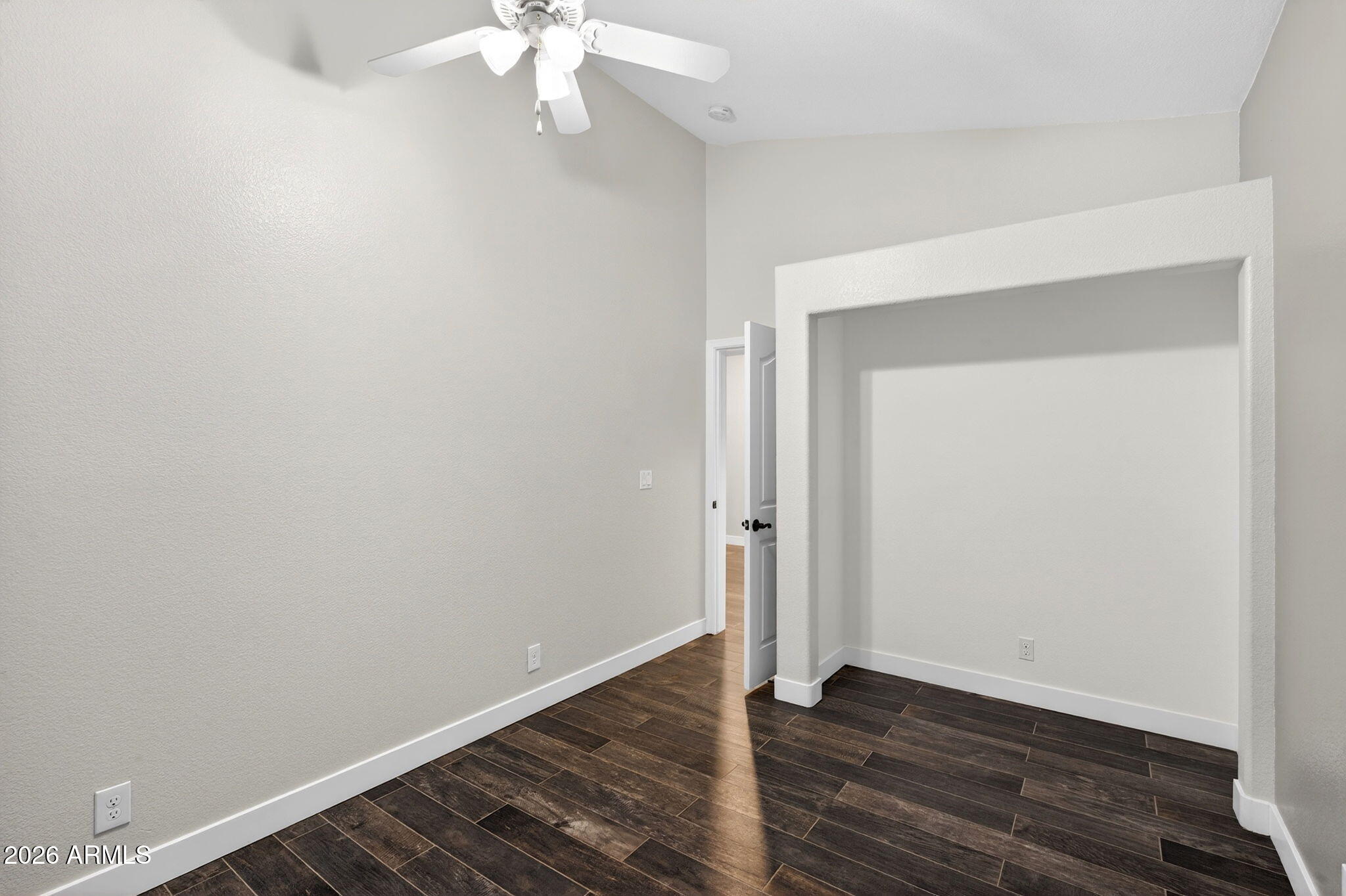 3242 North Ricardo Circle Mesa, AZ 85215 - Photo 37 of 79 a view of an empty room with wooden floor