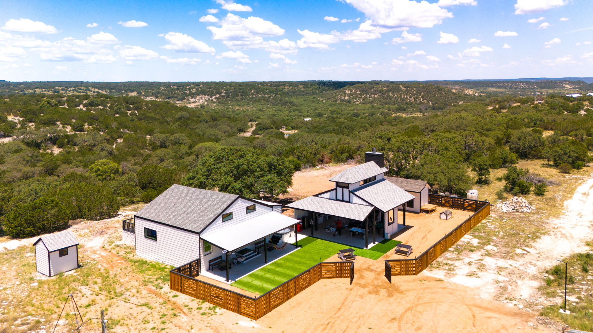 an aerial view of a house with a garden