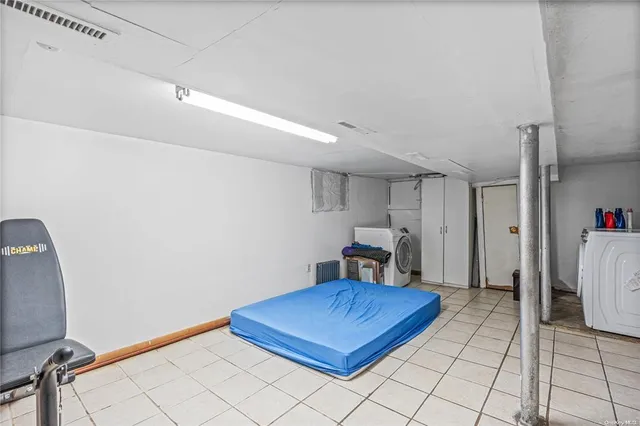 a view of a livingroom with furniture and a chandelier